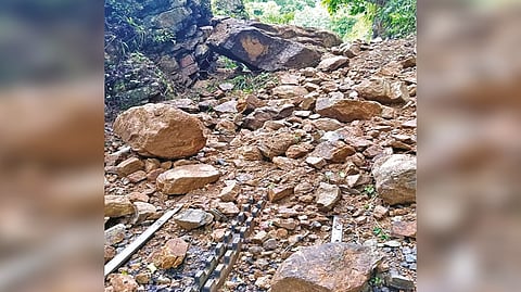 The NMR track obstructed by mud and boulders near Kallar station
