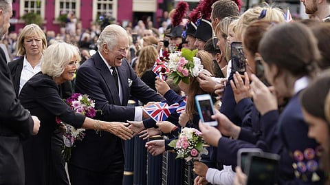 Britain's King Charles III and the Queen Consort meet well-wishers outside Hillsborough Castle