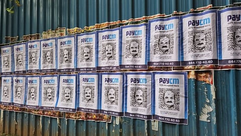'PayCM' poster released by the Opposition Congress has a portrait of the Chief Minister Basavaraj Bommai