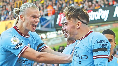 Manchester City?s Erling Haaland (left) celebrates with Jack Grealish after scoring a goal.
