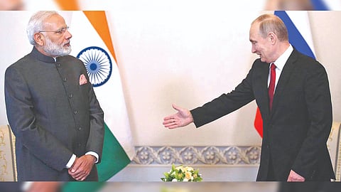 PM Modi with Russian President Vladimir Putin .