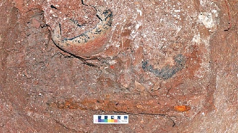 Iron sword found in an urn in Keeladi