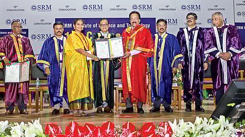A student receiving her degree at the 18th Convocation Day of SRMIST