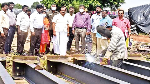 Food Minister R Sakkarapani inspecting the construction of a semi-godown