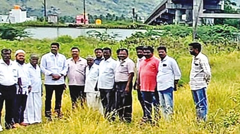 AIADMK MLA G Senthil Kumar and other officials inspecting the unfinished bridge in Vaniyambadi