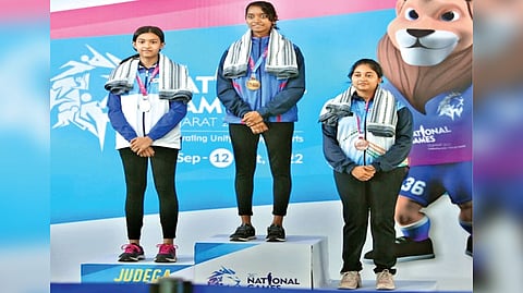 Gujarat?s Elavenil Valarivan on the podium with her yellow metal