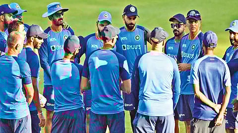 India players and staff in a huddle on the eve of the series opener