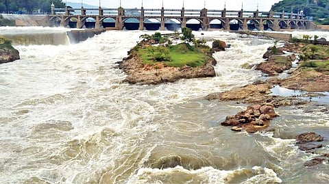 Water released from the 16-eye sluices of the Mettur dam