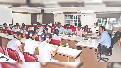 Classes 11 and 12 students from government schools interacting with Collector Dr Alby John Varghese at Tiruvallur Collectorate on Tuesday.