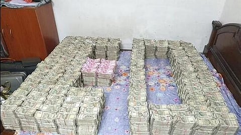 The seized money in connection with a probe into mobile gaming app fraud