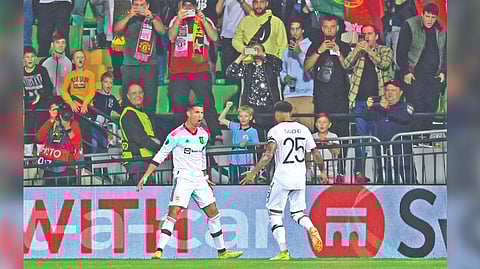Cristiano Ronaldo celebrates after doubling Manchester United?s advantage.