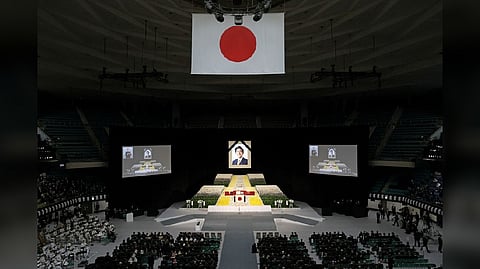 A portrait of Shinzo Abe hangs above the stage during the state funeral for Japan's former prime minister Shinzo Abe