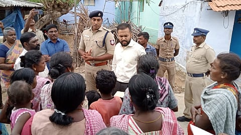 Tenkasi Collector P Akash along with SP R Krishnaraj and officials interact with people at Panchankulam village.