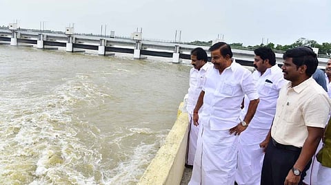 Minister KN Nehru with officials inspecting Mukkombu plateau, Tiruchirappalli district.