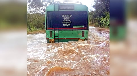 TNSTC bus stuck in the flooded river in Erode