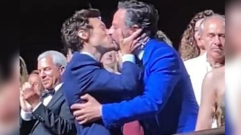 Harry Styles kissing Nick Kroll