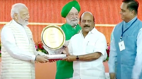 Minister Anbarasan receives award from PM Narendra Modi