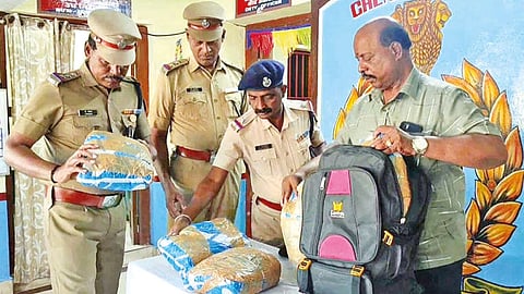 RPF personnel checking the abandoned bag at Chengalpattu railway station on Wednesday