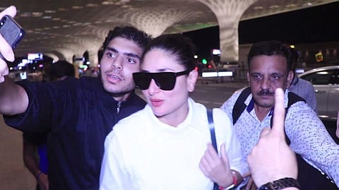 Kareena was mobbed by fans while  entering the airport.