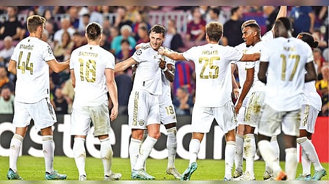 Bayern Munich?s Benjamin Pavard (centre) celebrates after scoring his team?s third goal.