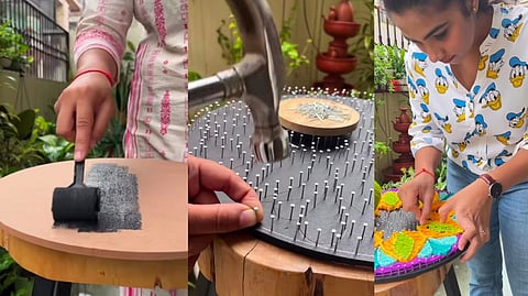 Screengrab from the video of a woman making rangoli