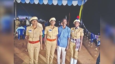 Agricultural labourer D Venketesan with his three girls who were placed in police force this year.