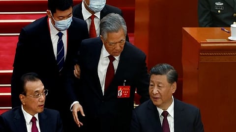 Hu Jintao being escorted out