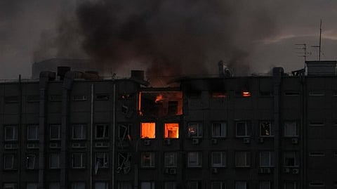 Smoke rises after a Russian drones strike in Kyiv