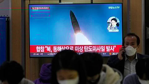 A TV screen shows a file image of North Korea's missile launch during a news program at the Seoul Railway Station in Seoul on Sept. 29.