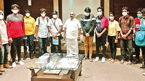 The 13 youth who returned from Myanmar with minister KS Masthan.