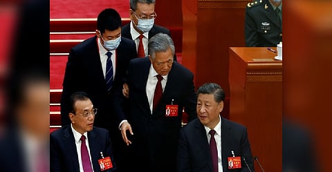 Former Chinese President Hu mysteriously escorted from closing session of congress
