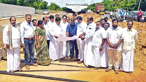 Tiruchy MP Su Thirunavukkarasar inspecting the ongoing bridge work in the city on Wednesday