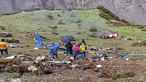 Locals at the site after a helicopter carrying pilgrims crashed near Kedarnath in Uttarakhan