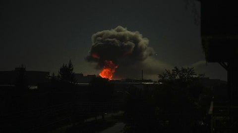 Smoke rises after big explosions in Kharkiv, Ukraine, early Saturday.