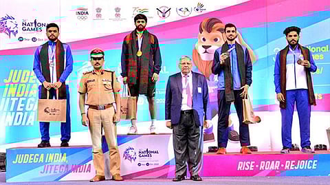 Sai Praneeth (2nd from left) after winning gold