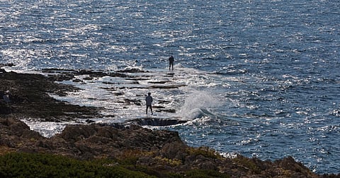 Fishermen catch fish, in Naqoura, near the Lebanese-Israeli border, southern Lebanon