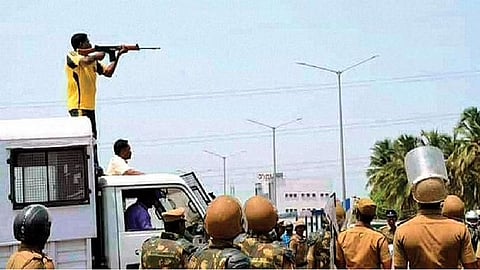 An officer targeting civilians during anti-Sterlite protests in 2018