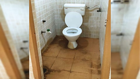 The women?s washroom, without a door, at the Jawaharlal Nehru Stadium