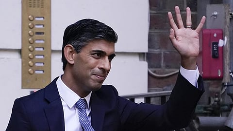 Rishi Sunak leaves the Conservative Campaign Headquarters in London.