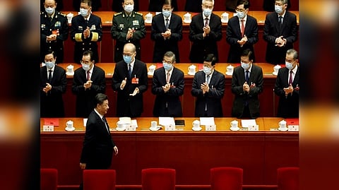 Chinese President Xi Jinping arrives for the closing session of the National People's Congress (NPC) at the Great Hall of the People in Beijing, March 11.