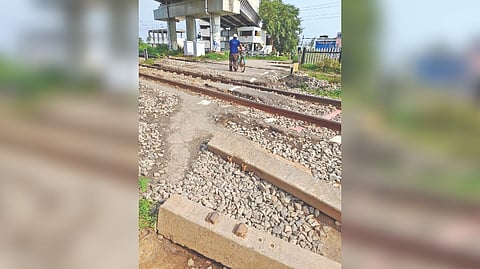 Damaged level crossing at Putlur station.