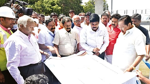 Minister Duraimurugan inspecting the Upper Anicut in Tiruchy on Saturday