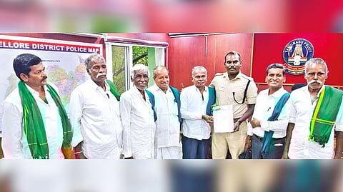 Vivasayigal Sangam leaders submitting a petition against a DMK man to SP S Rajesh Kannan in Vellore.