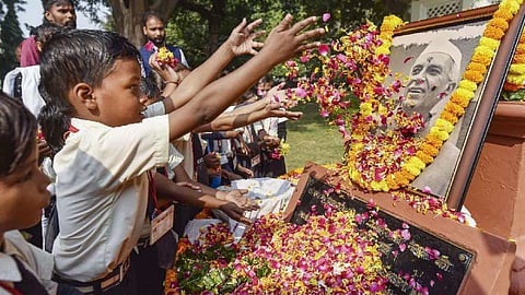 School students pay tribute to India's first prime minister Jawaharlal Nehru on his birth anniversary