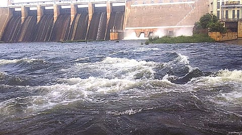 Excess water gushing out of Vaigai dam near Andipatti in Theni on Sunday.