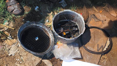 A cooker fitted with detonator, wires and batteries found during investigation