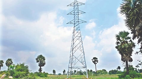 The power transmission tower on patta land at Brammapuram village in Katpadi taluk, Vellore