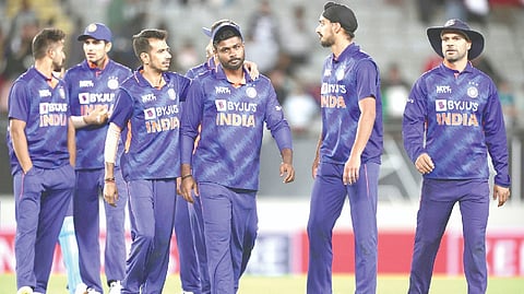 Indian players walk off the ground after their defeat to New Zealand in the first ODI