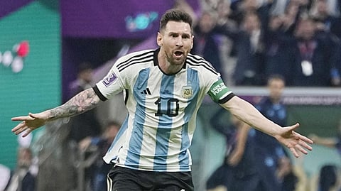 Argentina's Lionel Messi celebrates after scoring his side's opening goal during the World Cup group C soccer match between Argentina and Mexico, at the Lusail Stadium in Lusail, Qatar.