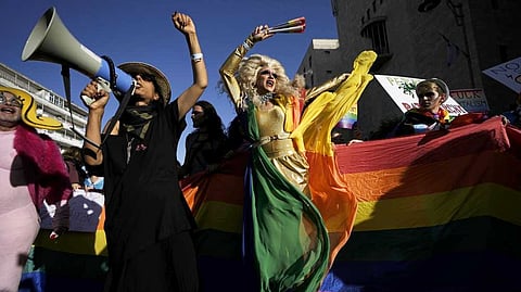 Participants march in the annual Pride Parade in Jerusalem.